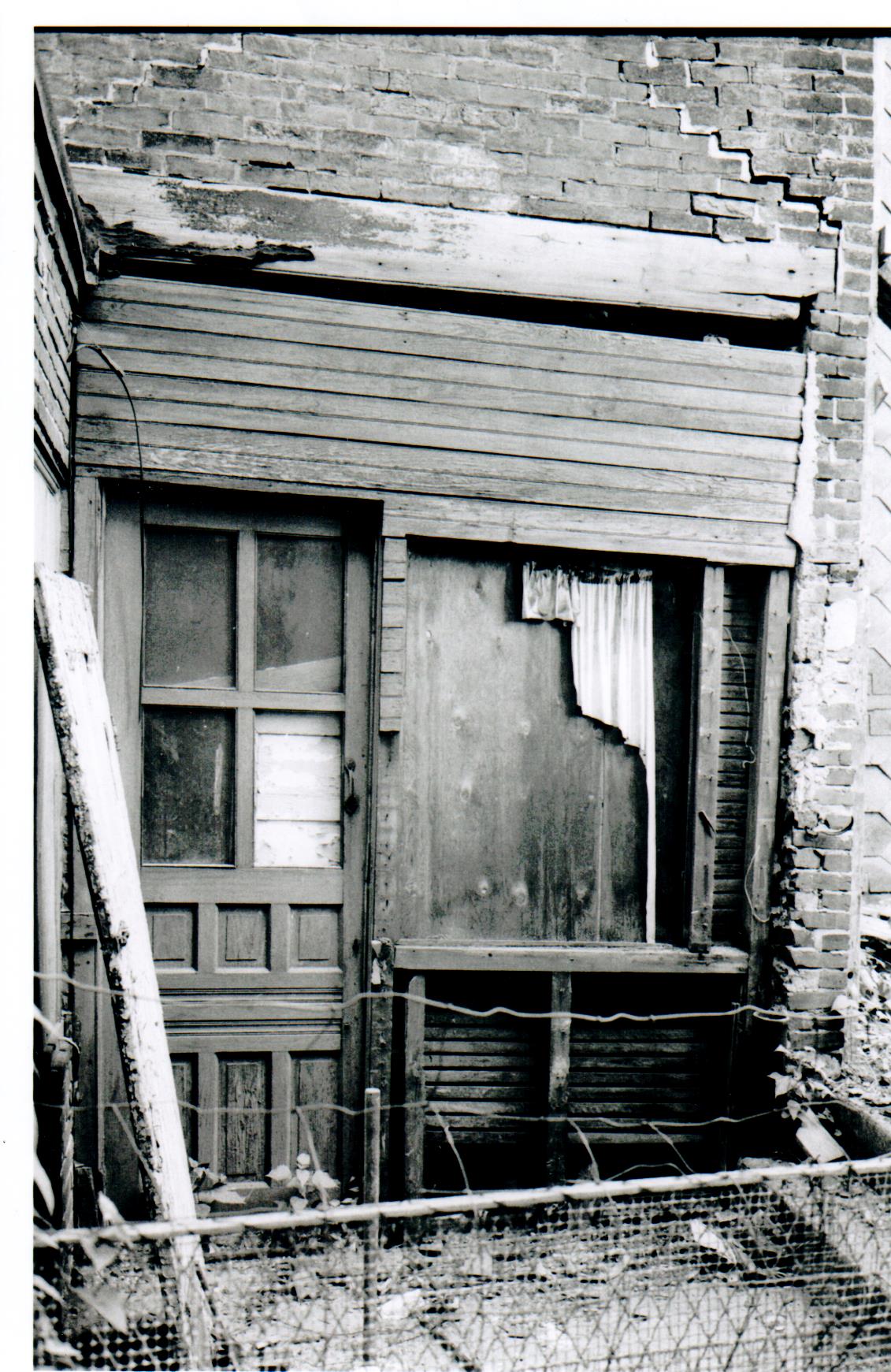 <p>209 Spruce Street - rear door, first floor, before restoration</p>
